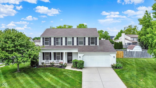 1234 Breaside Cir, Greenwood, IN 46143 - view of front of home with driveway, an attached garage, and a porch