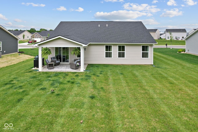 7051 E Bean Blossom Dr, Camby, IN 46113 - back of property with an outdoor hangout area, a lawn, a patio, a shingled roof, and a residential view