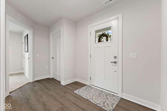 7051 E Bean Blossom Dr, Camby, IN 46113 - foyer entrance with dark wood-style flooring and baseboards
