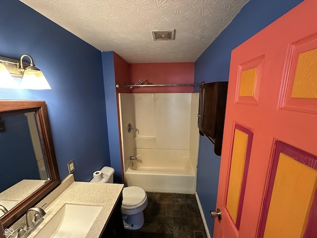 2133 10th St, Columbus, IN 47201 - bathroom featuring toilet, vanity, a textured ceiling, bathing tub / shower combination, and stone finish flooring