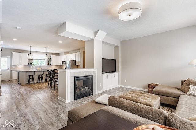 16072 Barringer Ct, Westfield, IN 46074 - living room with light wood-type flooring and recessed lighting