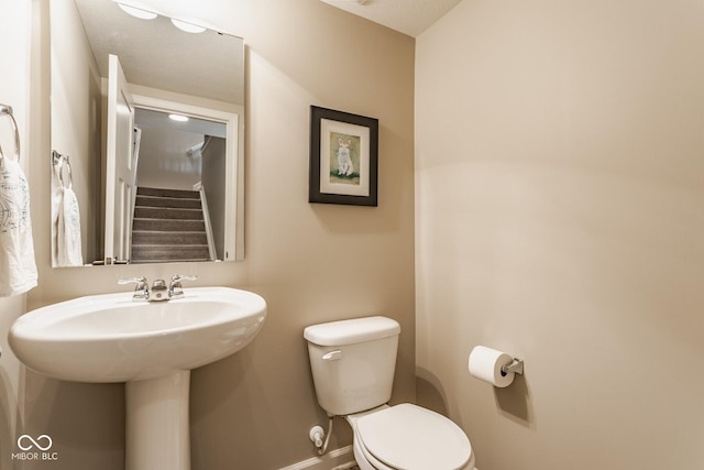 16072 Barringer Ct, Westfield, IN 46074 - half bath featuring toilet and baseboards