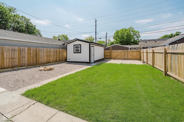 2909 E Michigan St, Indianapolis, IN 46201 - view of yard with an outdoor structure and a gate