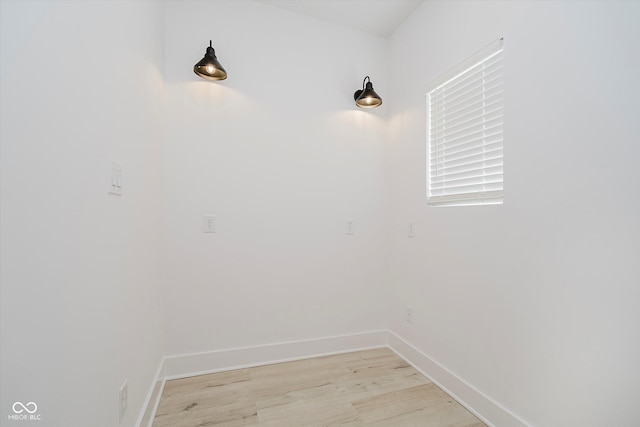 2909 E Michigan St, Indianapolis, IN 46201 - washroom featuring light wood-type flooring and baseboards