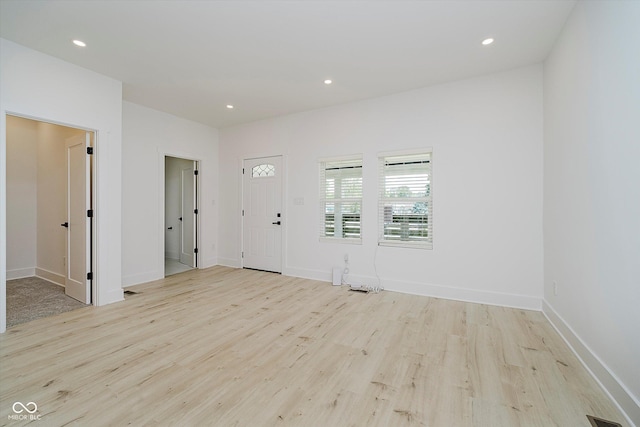 2909 E Michigan St, Indianapolis, IN 46201 - entryway featuring light wood-style flooring, recessed lighting, and baseboards