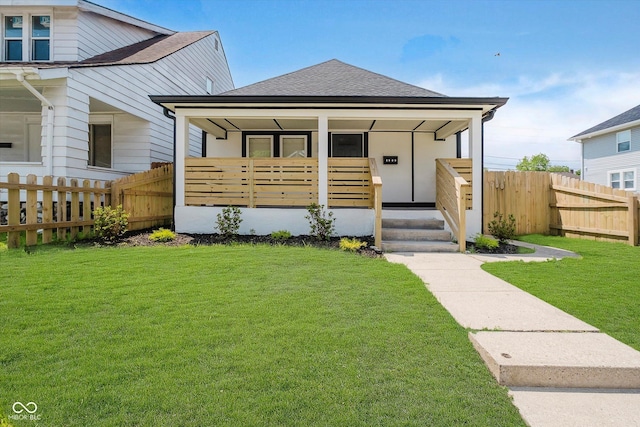 2909 E Michigan St, Indianapolis, IN 46201 - view of front of property featuring a shingled roof and a porch