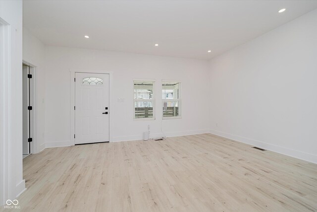 2909 E Michigan St, Indianapolis, IN 46201 - foyer featuring light wood-style flooring, baseboards, and recessed lighting