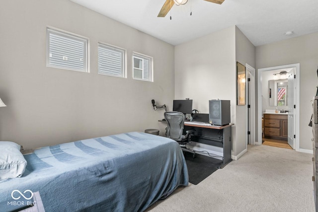 104 Perlican Dr, Cicero, IN 46034 - bedroom with light carpet, baseboards, ceiling fan, an office area, and ensuite bathroom