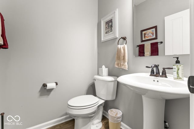 104 Perlican Dr, Cicero, IN 46034 - bathroom with toilet, wood finished floors, and baseboards