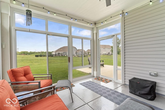 104 Perlican Dr, Cicero, IN 46034 - sunroom featuring a ceiling fan and a residential view