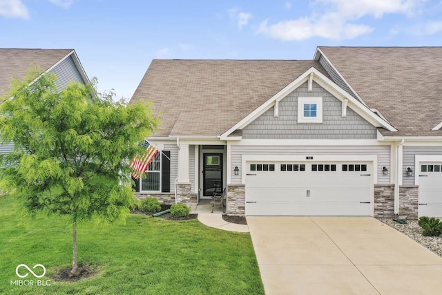 104 Perlican Dr, Cicero, IN 46034 - craftsman-style home featuring driveway, a front lawn, roof with shingles, and an attached garage