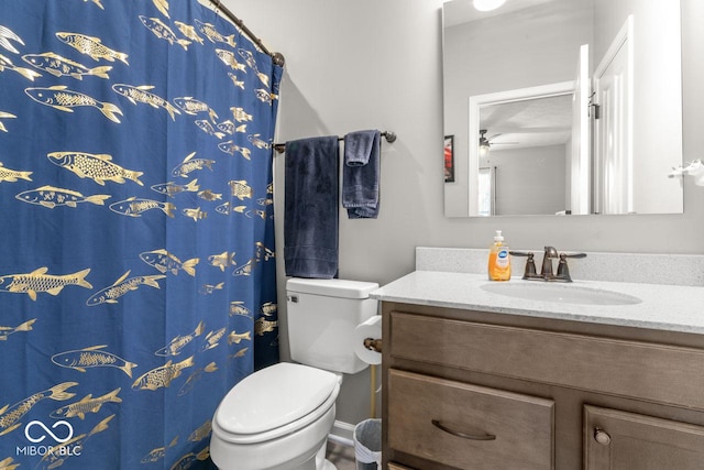 104 Perlican Dr, Cicero, IN 46034 - bathroom with vanity, toilet, a ceiling fan, and curtained shower