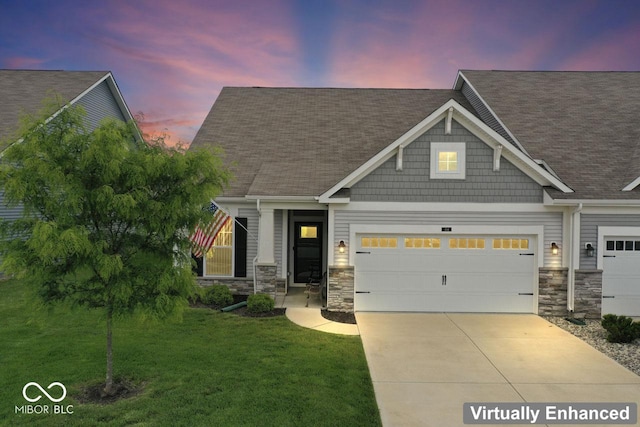 104 Perlican Dr, Cicero, IN 46034 - craftsman house featuring concrete driveway, a garage, a front lawn, stone siding, and a shingled roof