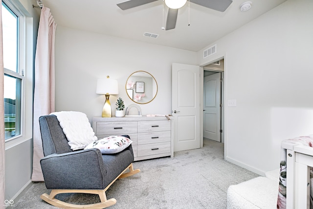 6841 Seabiscuit Rd, Whitestown, IN 46075 - sitting room featuring light carpet, a ceiling fan, and baseboards