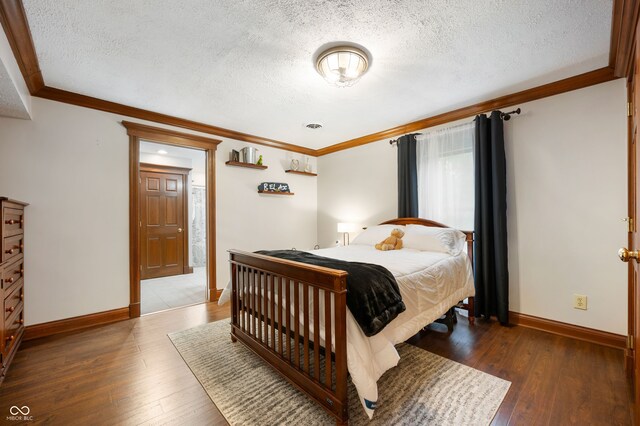 2708 N 400 E, Greenfield, IN 46140 - bedroom featuring crown molding, a textured ceiling, baseboards, and wood-type flooring