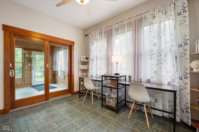 2708 N 400 E, Greenfield, IN 46140 - dining space featuring a ceiling fan, a desk, baseboards, and tile patterned floors