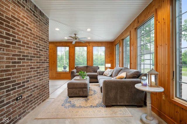 2708 N 400 E, Greenfield, IN 46140 - sunroom with brick wall, concrete floors, wooden walls, and recessed lighting