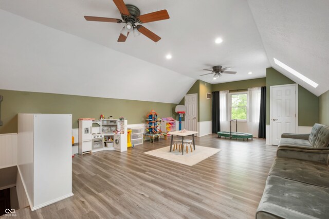 2708 N 400 E, Greenfield, IN 46140 - game room featuring ceiling fan, vaulted ceiling, and wood finished floors