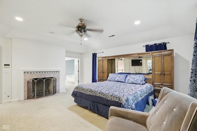7138 Nile Ridge Ct, Indianapolis, IN 46236 - bedroom with light carpet, recessed lighting, a fireplace, ceiling fan, and connected bathroom