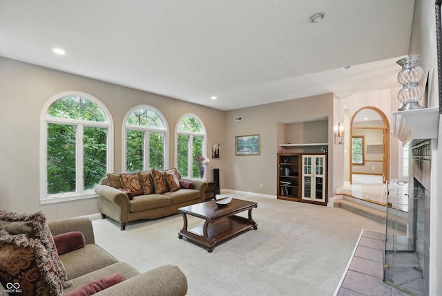 7138 Nile Ridge Ct, Indianapolis, IN 46236 - carpeted living area with recessed lighting, baseboards, and a fireplace