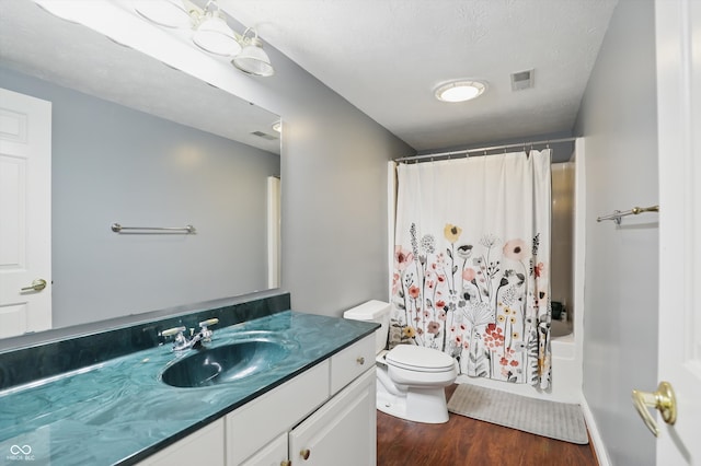 7138 Nile Ridge Ct, Indianapolis, IN 46236 - bathroom featuring vanity, wood finished floors, toilet, and shower / tub combo