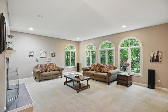 7138 Nile Ridge Ct, Indianapolis, IN 46236 - living area with recessed lighting, baseboards, light colored carpet, healthy amount of natural light, and a fireplace