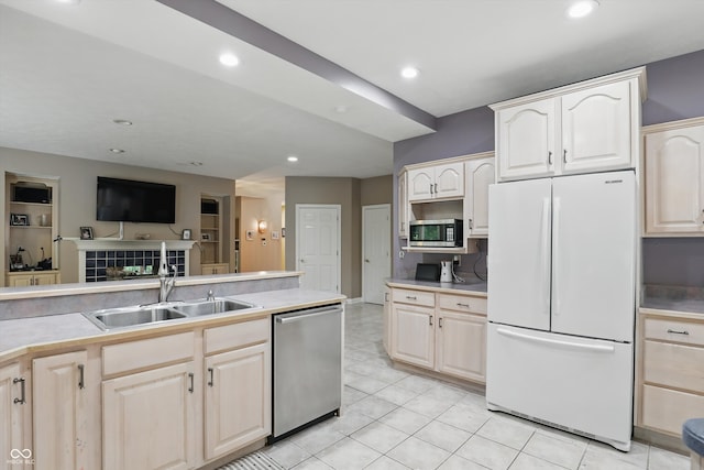 7138 Nile Ridge Ct, Indianapolis, IN 46236 - kitchen with appliances with stainless steel finishes, a sink, light countertops, recessed lighting, and open floor plan