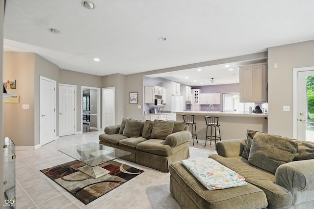 7138 Nile Ridge Ct, Indianapolis, IN 46236 - living room featuring recessed lighting, light tile patterned floors, and baseboards