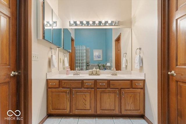 6363 Harmonridge Ct, Indianapolis, IN 46278 - full bath featuring double vanity, tile patterned floors, and baseboards