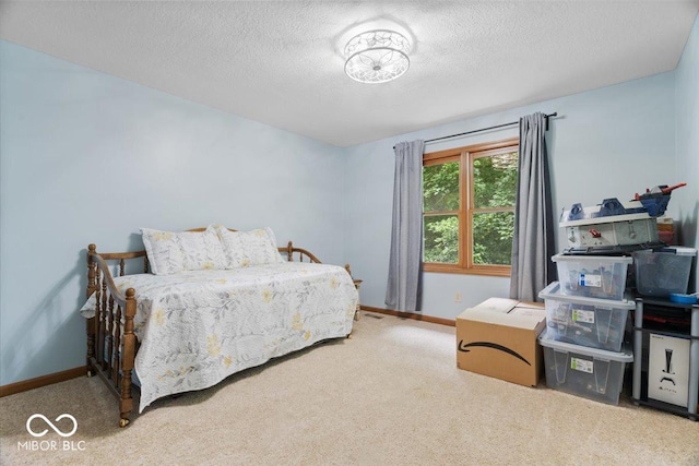 6363 Harmonridge Ct, Indianapolis, IN 46278 - bedroom with carpet floors, a textured ceiling, and baseboards