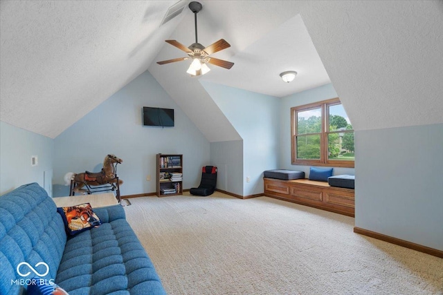 6363 Harmonridge Ct, Indianapolis, IN 46278 - living area with lofted ceiling, a textured ceiling, baseboards, carpet floors, and a ceiling fan