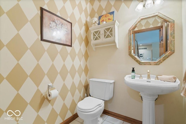 6363 Harmonridge Ct, Indianapolis, IN 46278 - bathroom featuring toilet, tile patterned flooring, and baseboards