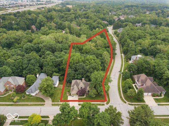 6363 Harmonridge Ct, Indianapolis, IN 46278 - aerial view of property and surrounding area featuring a heavily wooded area and property boundaries highlighted