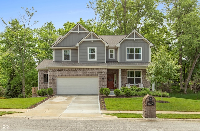 527 Macintosh Ln, Danville, IN 46122 - craftsman-style home with board and batten siding, a front lawn, and driveway