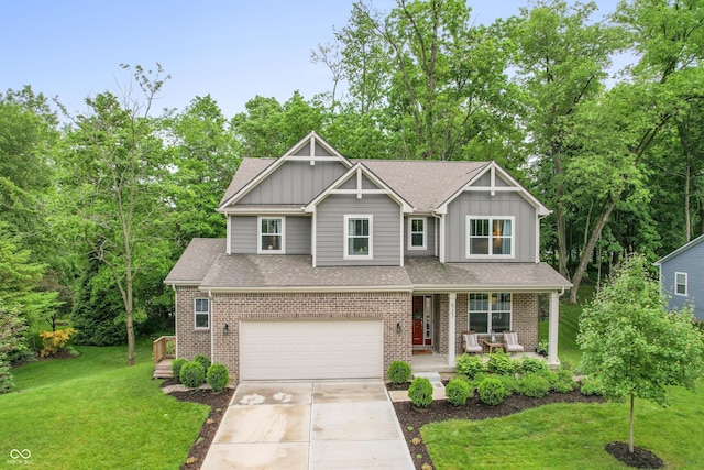 527 Macintosh Ln, Danville, IN 46122 - craftsman-style house featuring covered porch, board and batten siding, driveway, and a front lawn