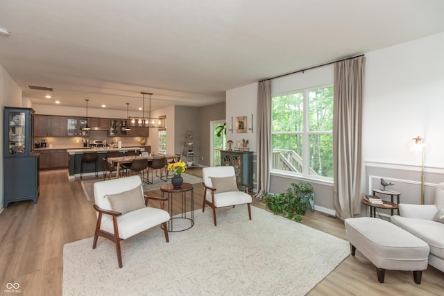 527 Macintosh Ln, Danville, IN 46122 - living room featuring light wood-type flooring and baseboards