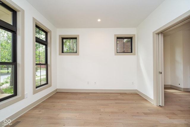 1818 Central Ave, Indianapolis, IN 46202 - empty room with light wood finished floors, recessed lighting, and baseboards