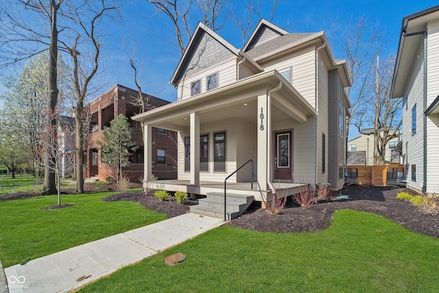 1818 Central Ave, Indianapolis, IN 46202 - victorian-style house with a porch and a front yard