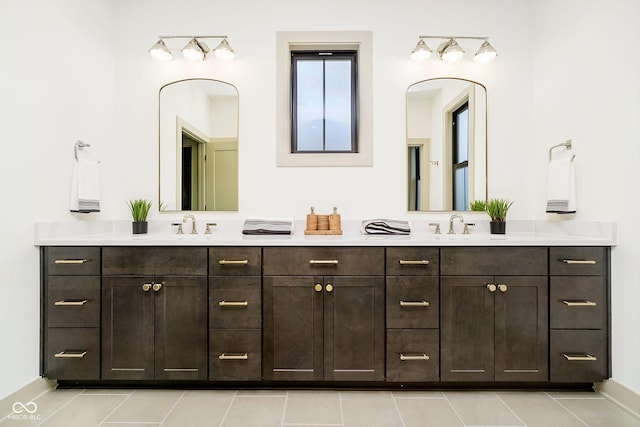 1818 Central Ave, Indianapolis, IN 46202 - full bathroom with double vanity and tile patterned flooring