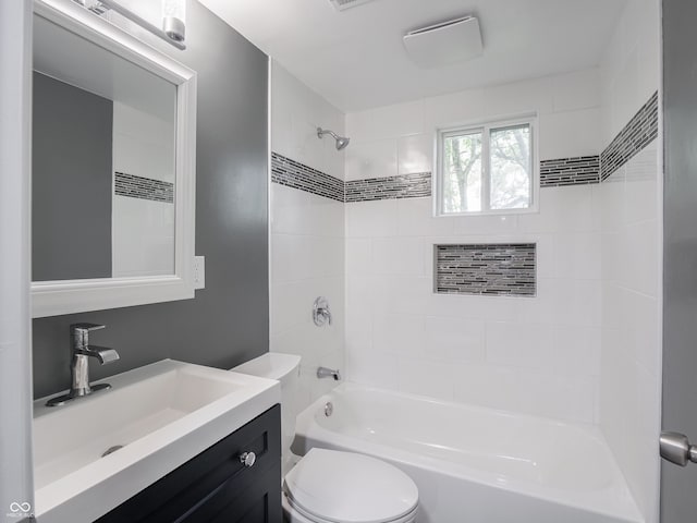 1141 Temperance Ave, Indianapolis, IN 46203 - full bathroom featuring toilet, washtub / shower combination, and vanity