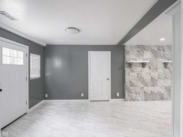 1141 Temperance Ave, Indianapolis, IN 46203 - foyer featuring marble finish flooring and baseboards