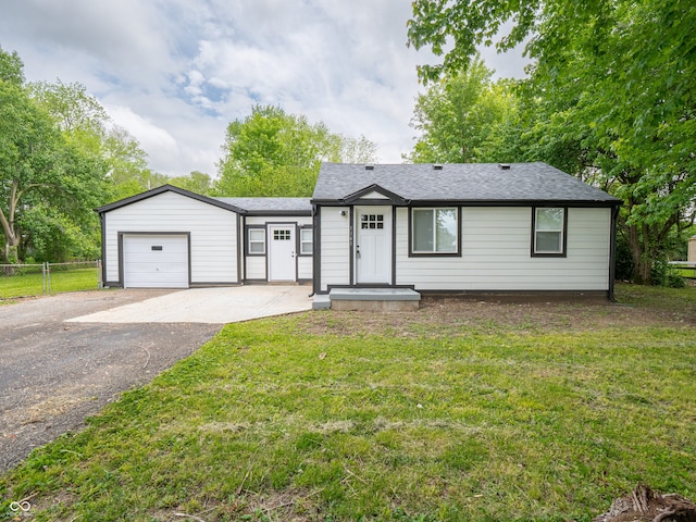 1141 Temperance Ave, Indianapolis, IN 46203 - ranch-style house with a garage, asphalt driveway, and a shingled roof