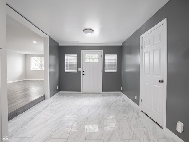 1141 Temperance Ave, Indianapolis, IN 46203 - foyer with baseboards, light marble finish flooring, and recessed lighting