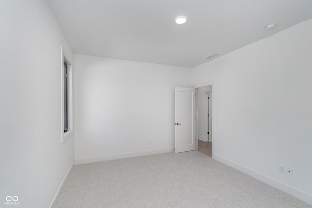 1822 Central Ave, Indianapolis, IN 46202 - spare room featuring light colored carpet and baseboards