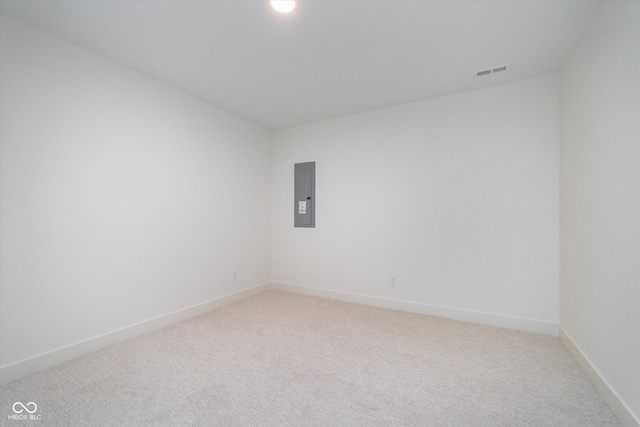 1822 Central Ave, Indianapolis, IN 46202 - empty room with electric panel, light colored carpet, and baseboards