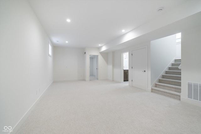1822 Central Ave, Indianapolis, IN 46202 - below grade area with stairs, recessed lighting, light carpet, and baseboards