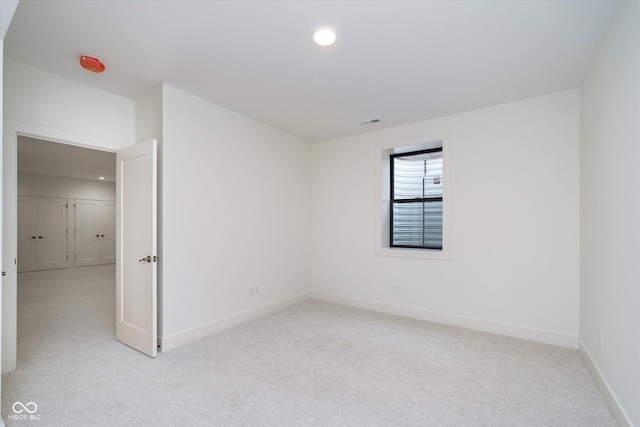 1822 Central Ave, Indianapolis, IN 46202 - empty room with light carpet, baseboards, and recessed lighting