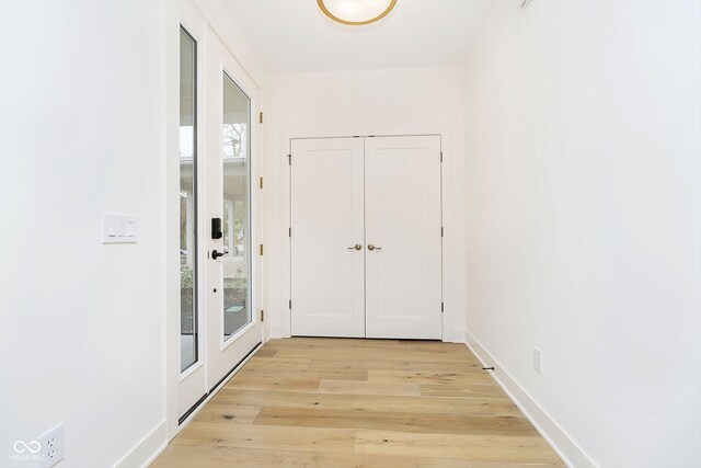 1822 Central Ave, Indianapolis, IN 46202 - doorway with light wood-type flooring and baseboards