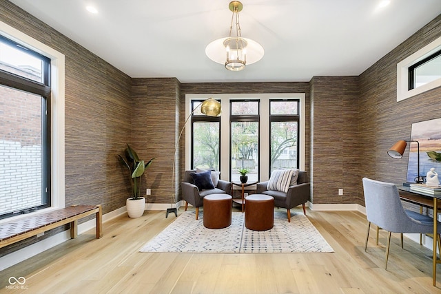 1822 Central Ave, Indianapolis, IN 46202 - living area featuring baseboards, plenty of natural light, and light wood finished floors
