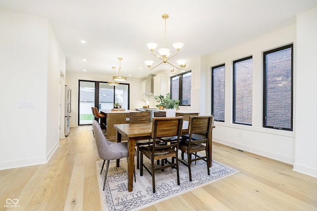 1822 Central Ave, Indianapolis, IN 46202 - dining room featuring light wood-style floors, a chandelier, baseboards, and recessed lighting